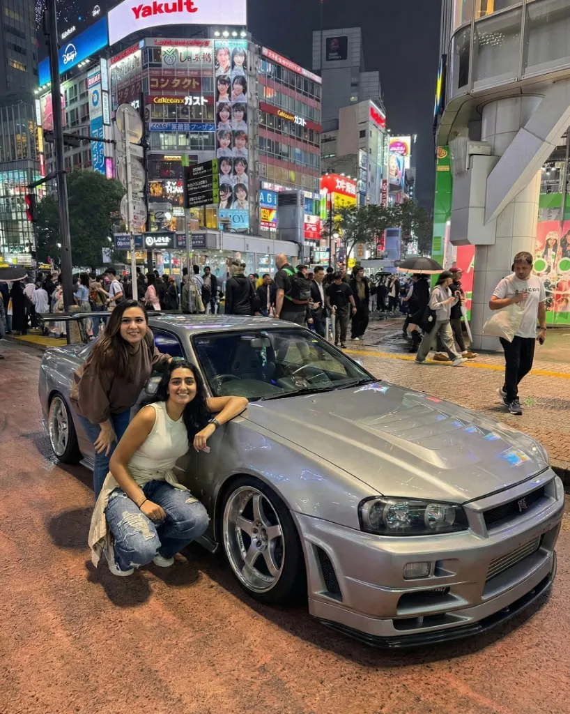 JDM car tour driving through Shibuya Crossing in Tokyo